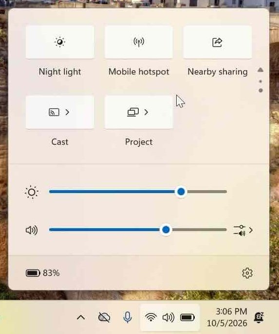 Find the Cast icon on the second page of the quick settings menu